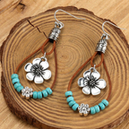Pendientes boho de plata con flor y turquesa