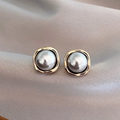 Pendientes vintage elegantes con perlas