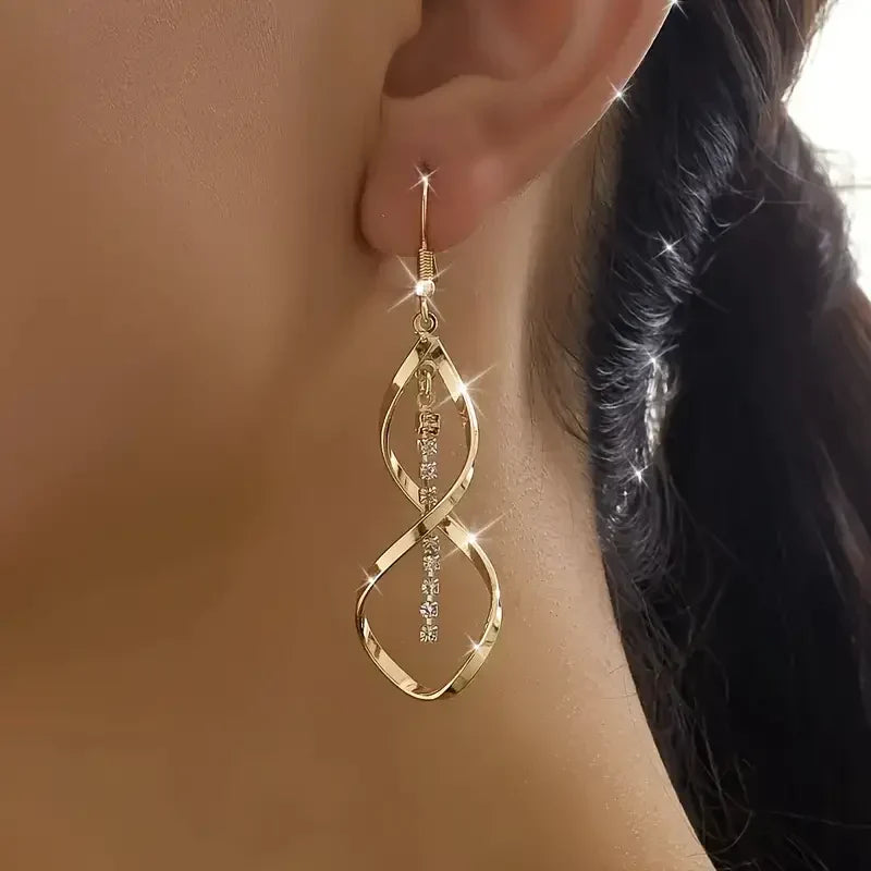 Pendientes Espiral Rayo de Sol | Dorados