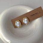 Pendientes elegantes de perlas de Carmen