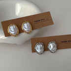 Pendientes elegantes de perlas de Carmen