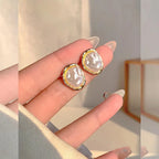 Pendientes elegantes de perlas de Carmen